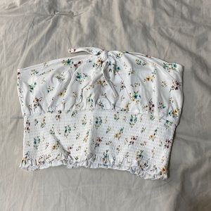 Strapless top with flowers. Size medium. Brand new